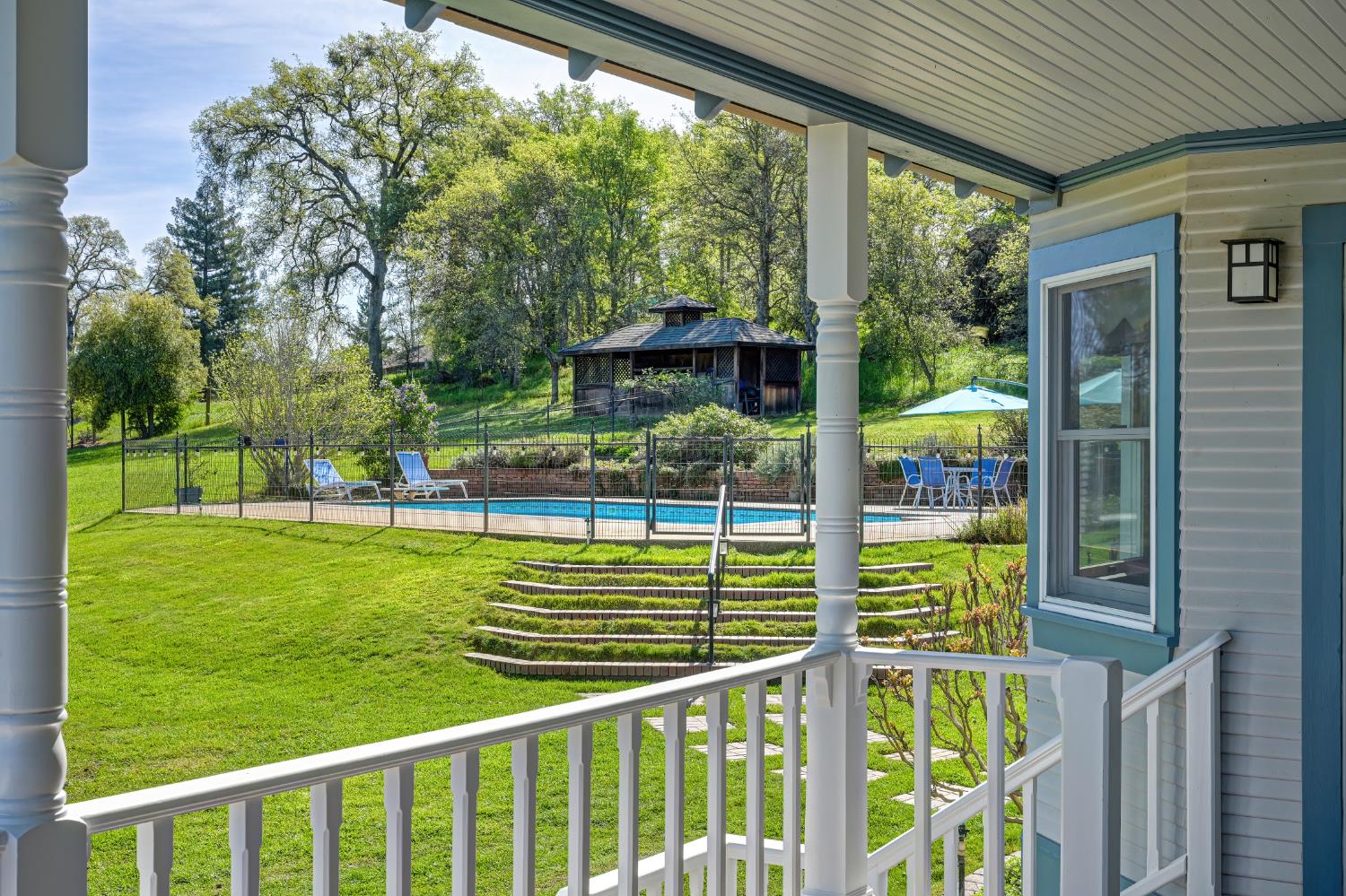 10800 Pickle Barrel Road Auburn, CA 95602 - Photo 33 of 82 a view of a porch with furniture and garden