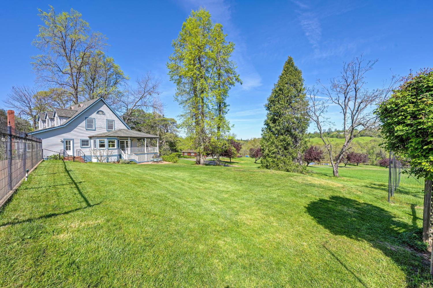 10800 Pickle Barrel Road Auburn, CA 95602 - Photo 55 of 82 a view of a house with a big yard