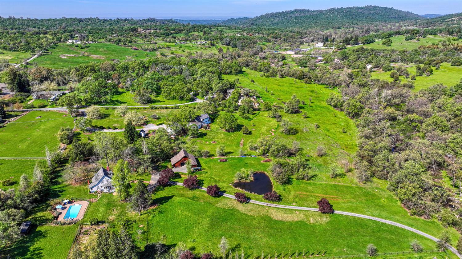 10800 Pickle Barrel Road Auburn, CA 95602 - Photo 57 of 82 a view of a lush green field with lots of bushes