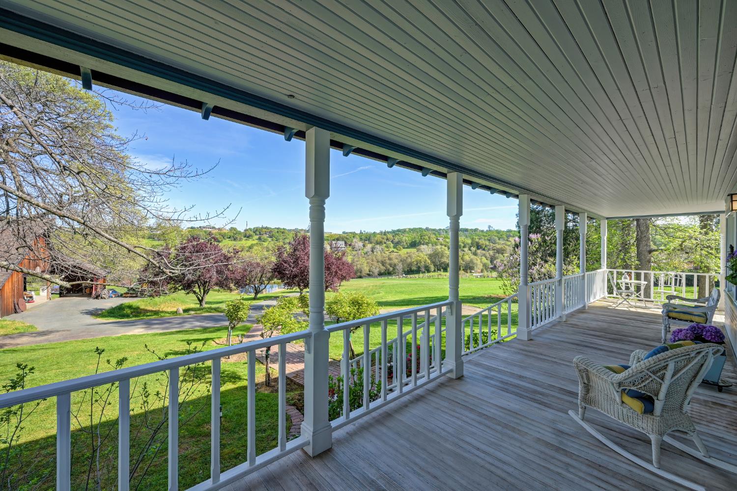 10800 Pickle Barrel Road Auburn, CA 95602 - Photo 6 of 82 a view of a deck with wooden floor and fence