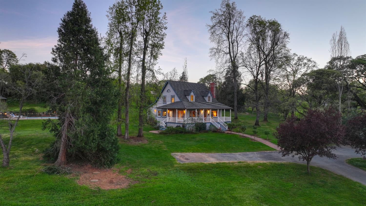 10800 Pickle Barrel Road Auburn, CA 95602 - Photo 62 of 82 a view of a garden with a house in the background