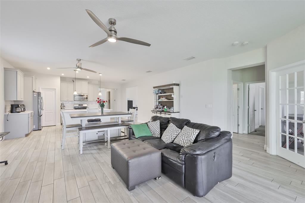 5418 Silver Sun Drive Apollo Beach, FL 33572 - Photo 13 of 65 a living room with furniture and a wooden floor