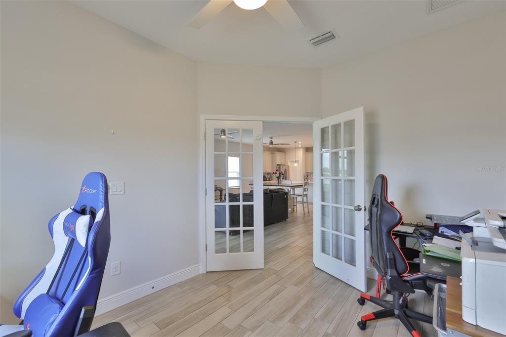 5418 Silver Sun Drive Apollo Beach, FL 33572 - Photo 23 of 65 a view of a room with gym equipment