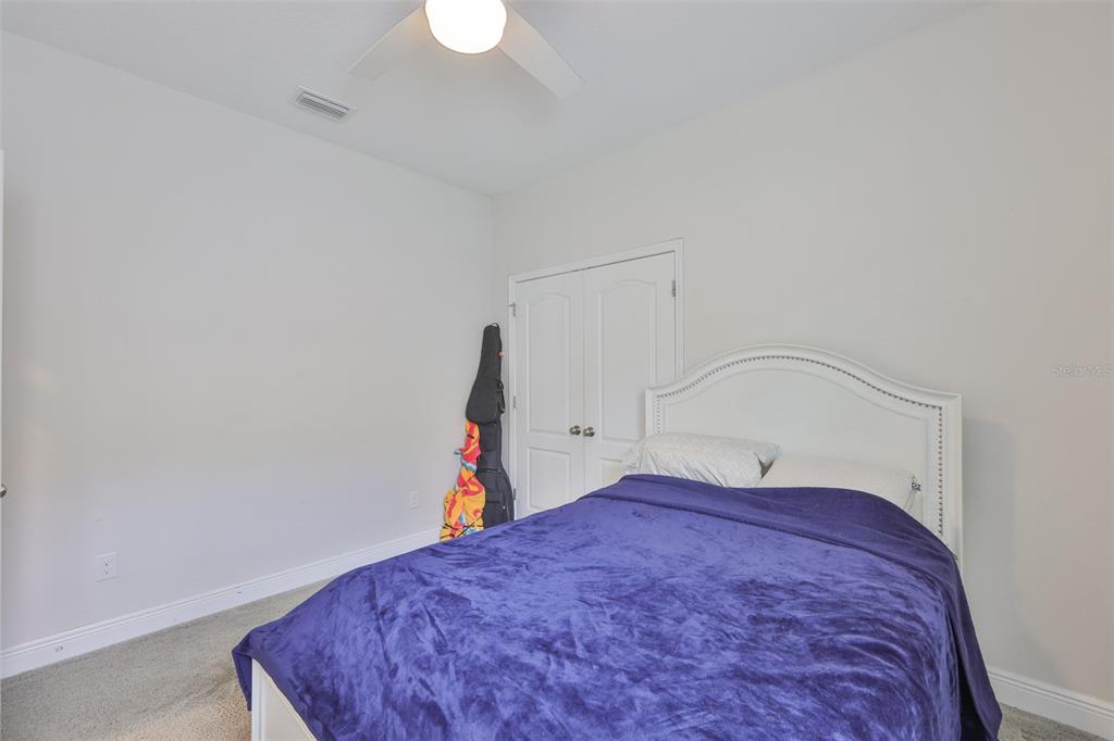 5418 Silver Sun Drive Apollo Beach, FL 33572 - Photo 31 of 65 a view of a room with rack and wooden floor