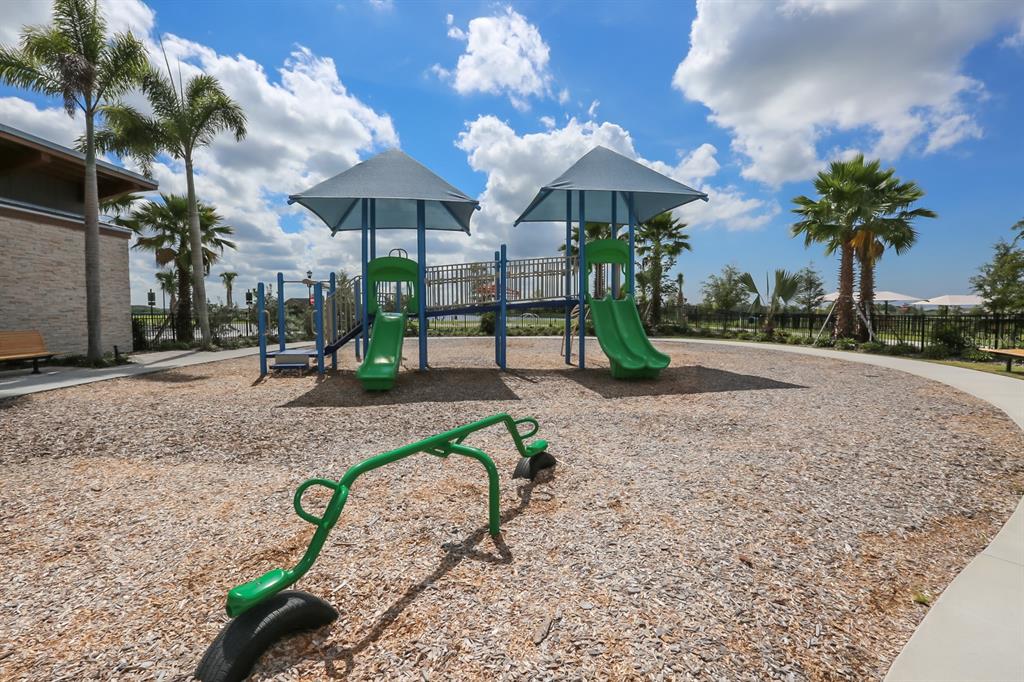 5418 Silver Sun Drive Apollo Beach, FL 33572 - Photo 52 of 65 a view of a park with a slide and table