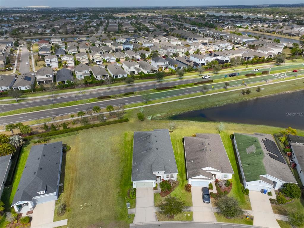 5418 Silver Sun Drive Apollo Beach, FL 33572 - Photo 64 of 65 an aerial view of residential houses with outdoor space