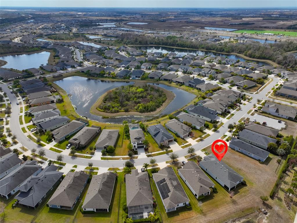 5418 Silver Sun Drive Apollo Beach, FL 33572 - Photo 65 of 65 an aerial view of residential houses with outdoor space
