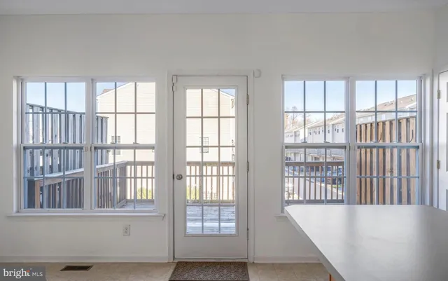 a workspace with furniture and window