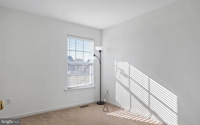 a view of a bathroom with closet area