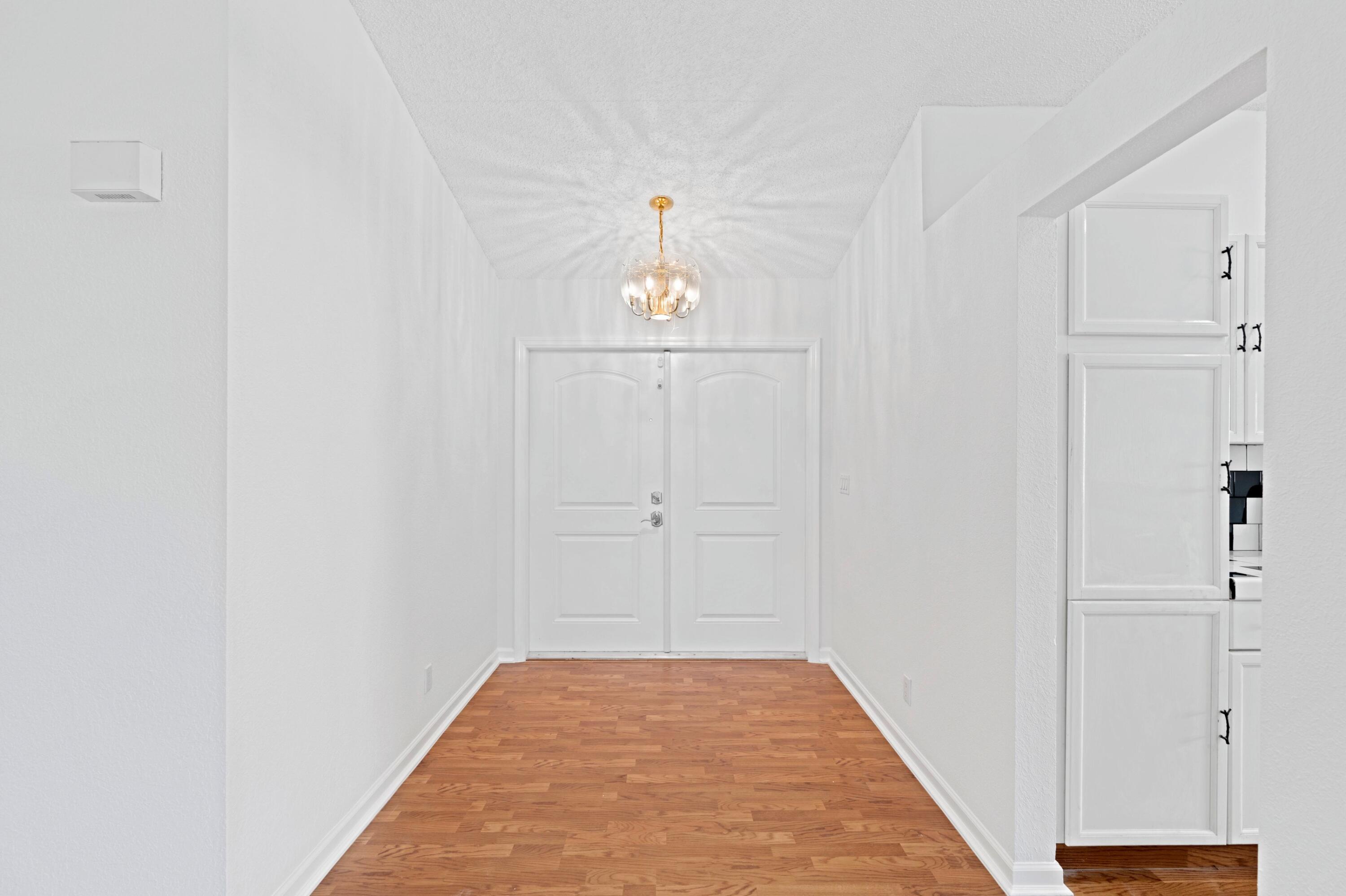 7944 Texas Trail Boca Raton, FL 33487 - Photo 14 of 27 a view of a hallway to rooms