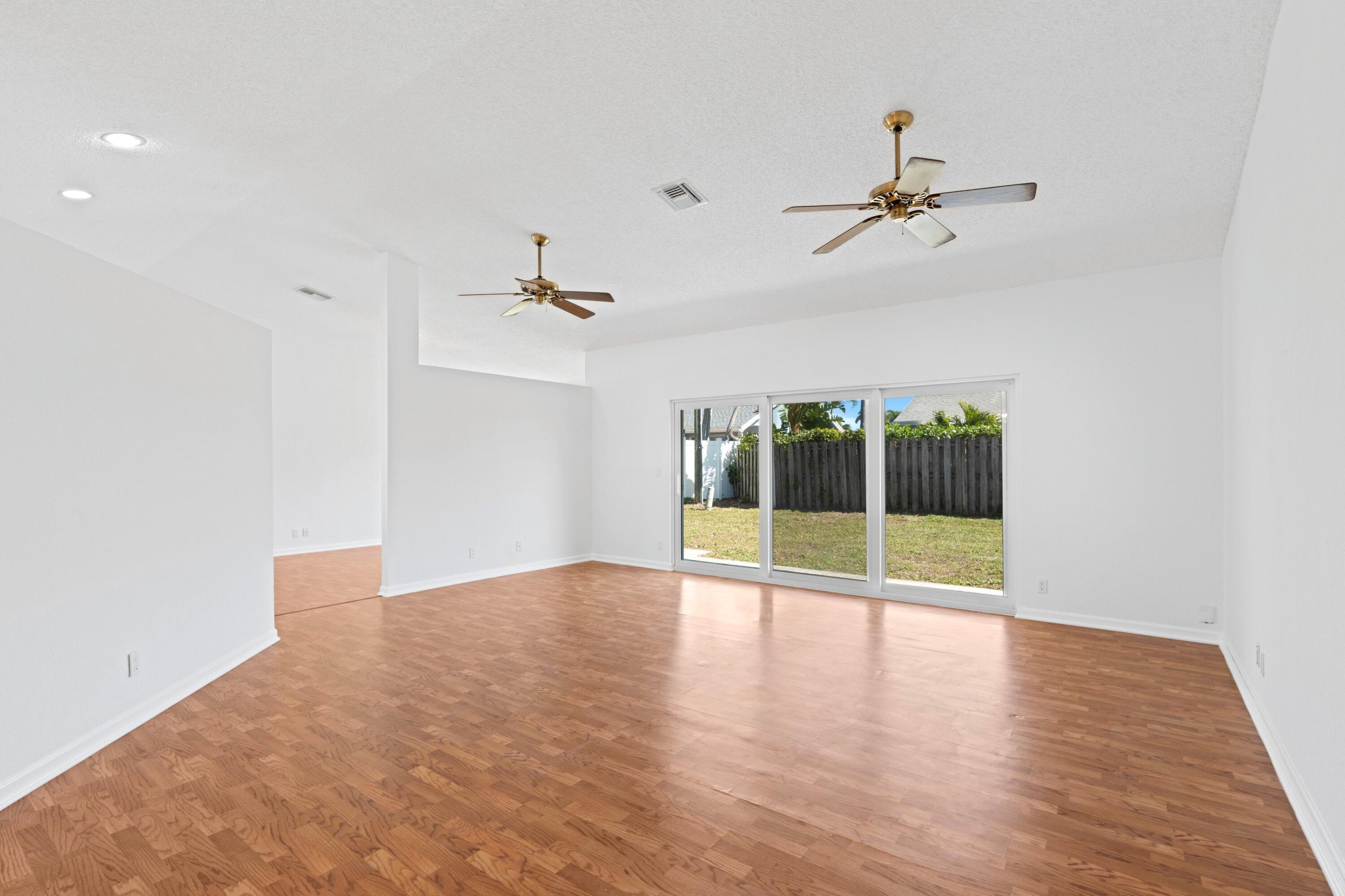 7944 Texas Trail Boca Raton, FL 33487 - Photo 3 of 27 a view of an empty room with a window