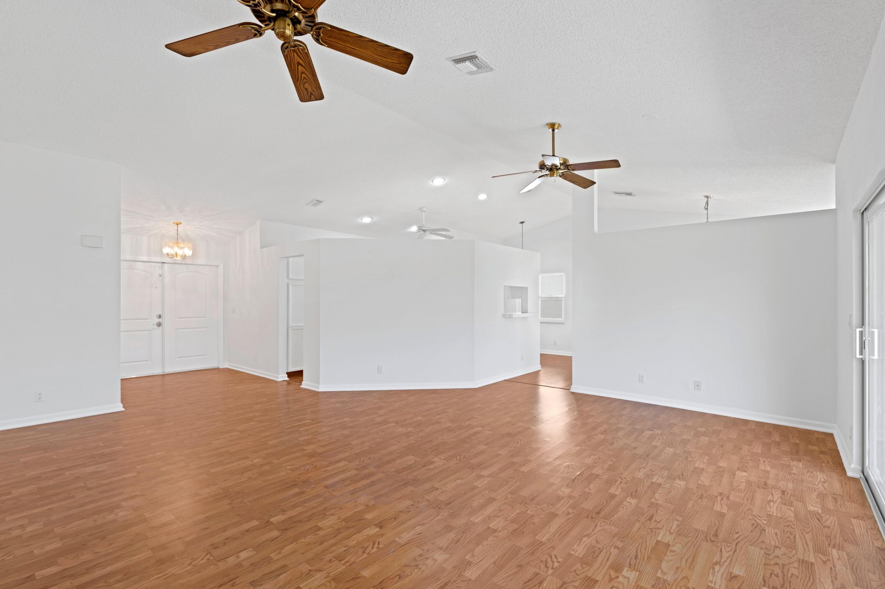 7944 Texas Trail Boca Raton, FL 33487 - Photo 4 of 27 a view of an empty room with a ceiling fan