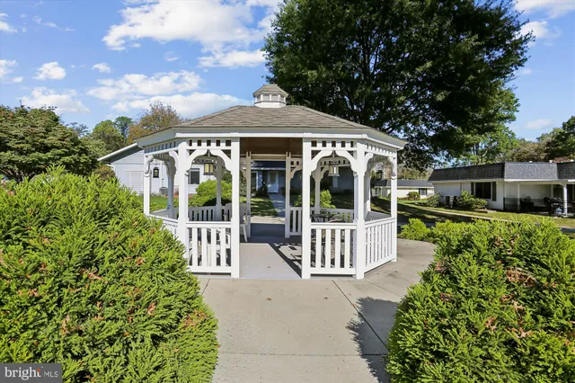 front view of a house with a garden