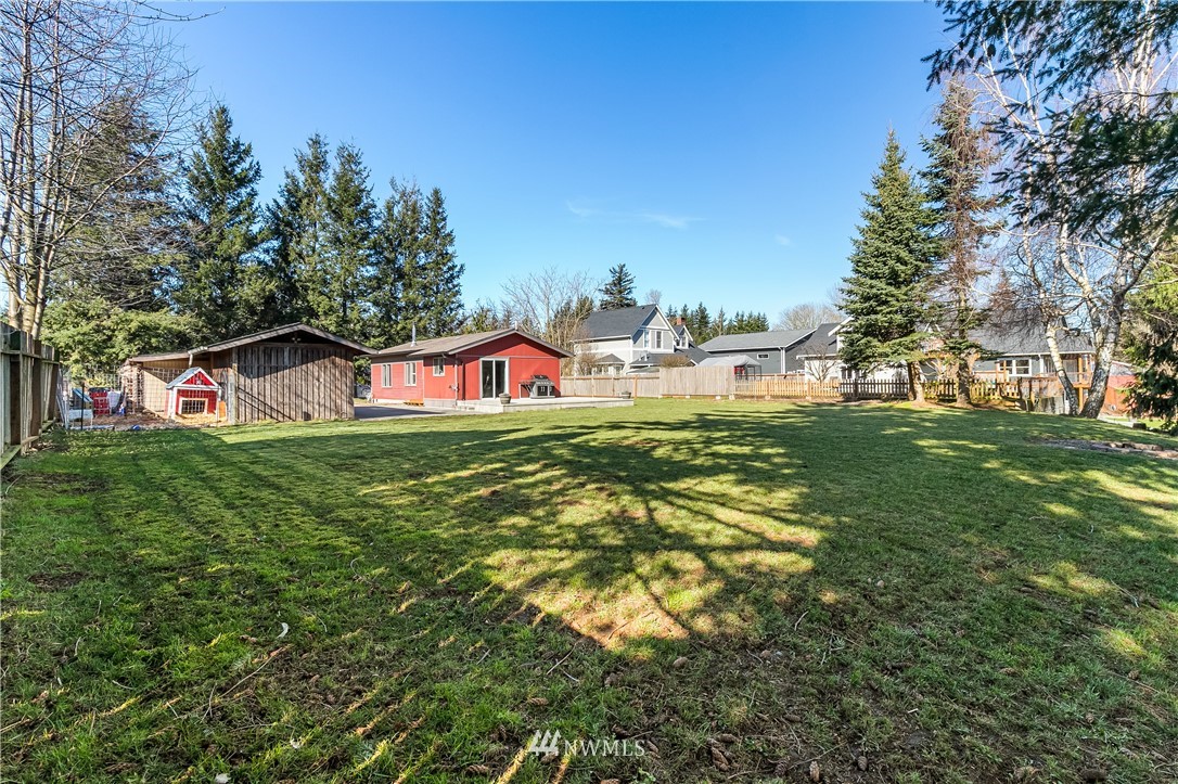 1104 Mission Road Everson, WA 98247 - Photo 8 of 34 a house view with swimming pool in front of it