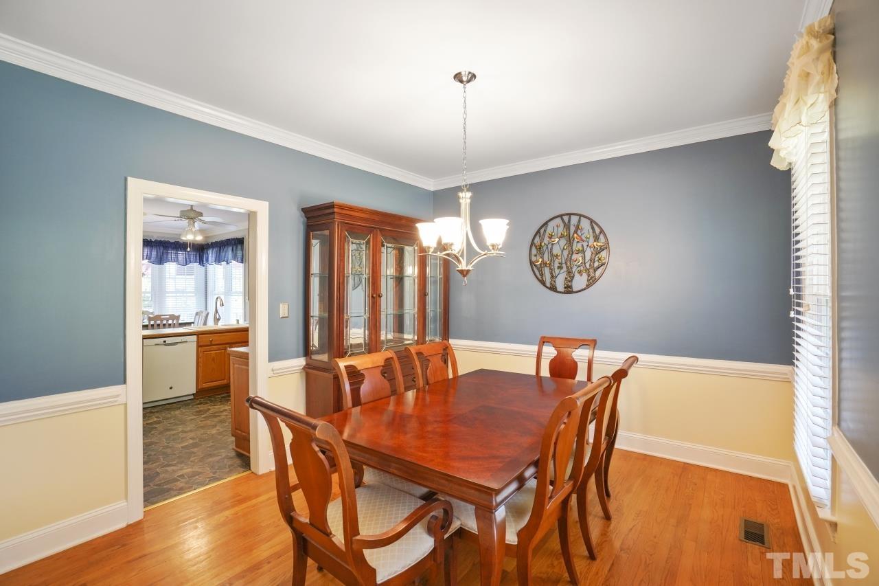 1505 Habbot Drive Raleigh, NC 27603 - Photo 14 of 32 a dining room with furniture and window