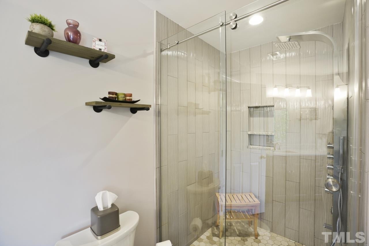 1505 Habbot Drive Raleigh, NC 27603 - Photo 19 of 32 a bathroom with a shower