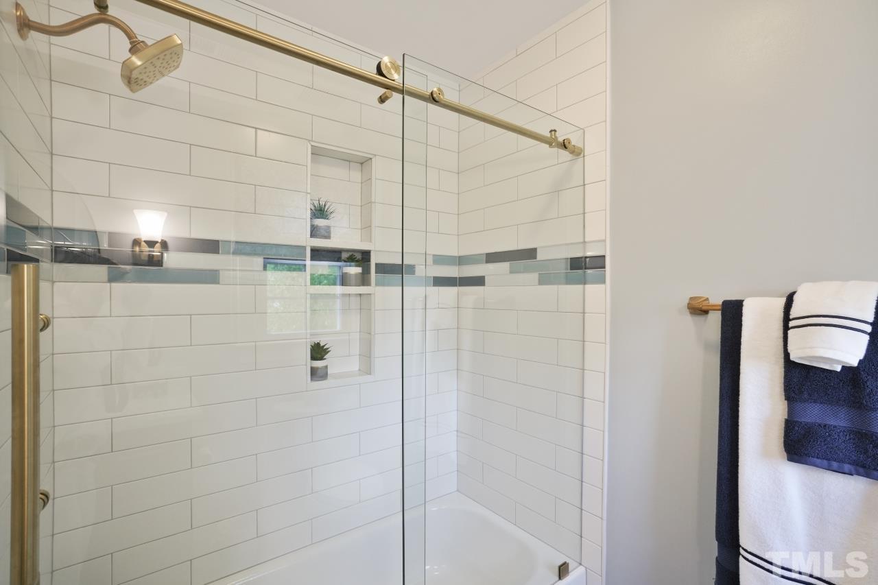 1505 Habbot Drive Raleigh, NC 27603 - Photo 23 of 32 a bathroom with a shower