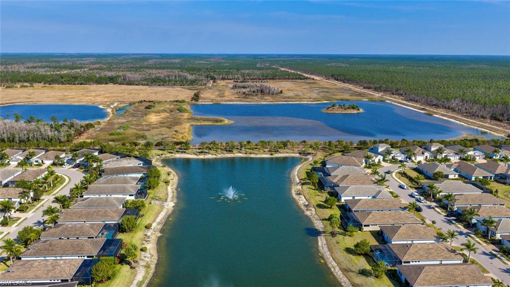 28041 Captiva Shell Loop Bonita Springs, FL 34135 - Photo 18 of 24 an aerial view of residential houses with outdoor space