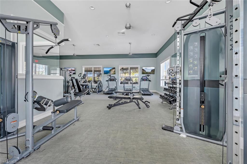 28041 Captiva Shell Loop Bonita Springs, FL 34135 - Photo 22 of 24 a view of a room with gym equipment