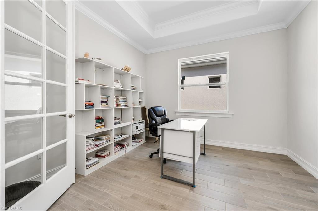 28041 Captiva Shell Loop Bonita Springs, FL 34135 - Photo 6 of 24 a workspace with furniture