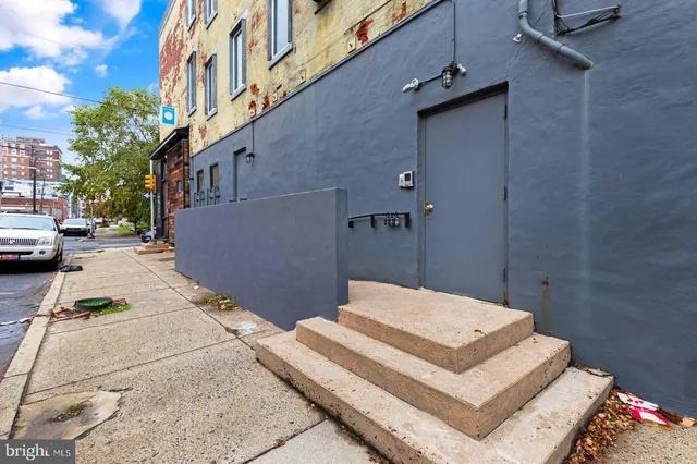 a front view of a house with parking