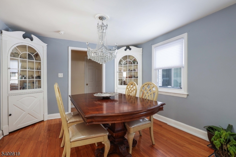 1841 Cider Mill Road Union, NJ 07083 - Photo 14 of 36 a view of a dining room with furniture window and wooden floor