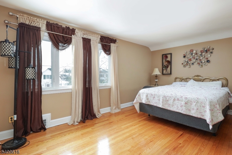 1841 Cider Mill Road Union, NJ 07083 - Photo 18 of 36 a bedroom with a bed and a window