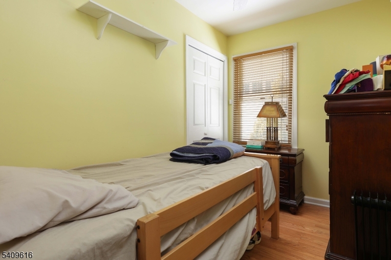 1841 Cider Mill Road Union, NJ 07083 - Photo 22 of 36 a bedroom with a bed and a window