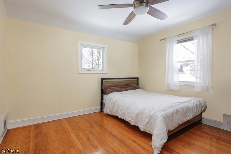 1841 Cider Mill Road Union, NJ 07083 - Photo 24 of 36 a bedroom with a bed and window