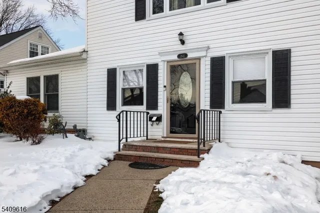 a living room with furniture fireplace and flat screen tv