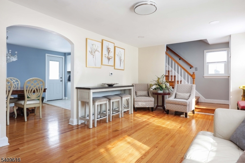 1841 Cider Mill Road Union, NJ 07083 - Photo 7 of 36 a living room with furniture and a wooden floor