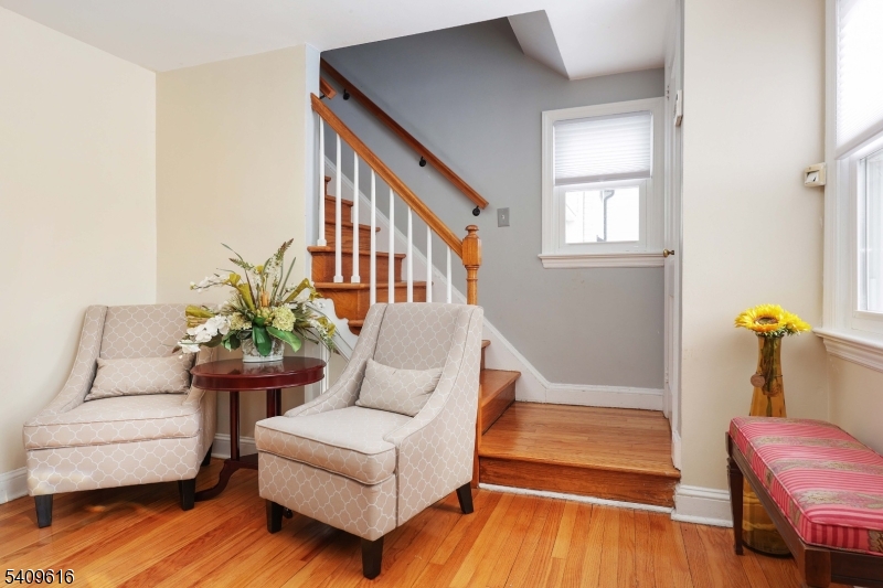 1841 Cider Mill Road Union, NJ 07083 - Photo 8 of 36 a living room with furniture and wooden floor