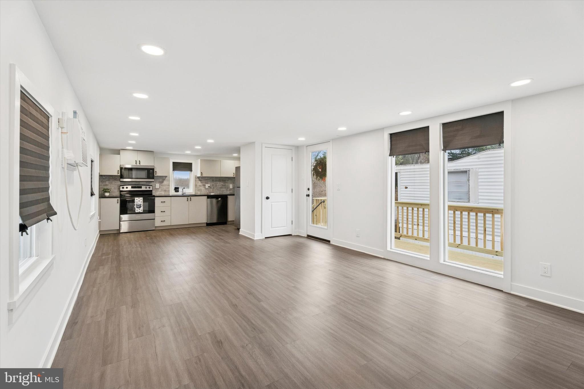 841 Cypress Ave Spring Spring City, PA 19475 - Photo 7 of 15 a view of a kitchen with a sink and a refrigerator