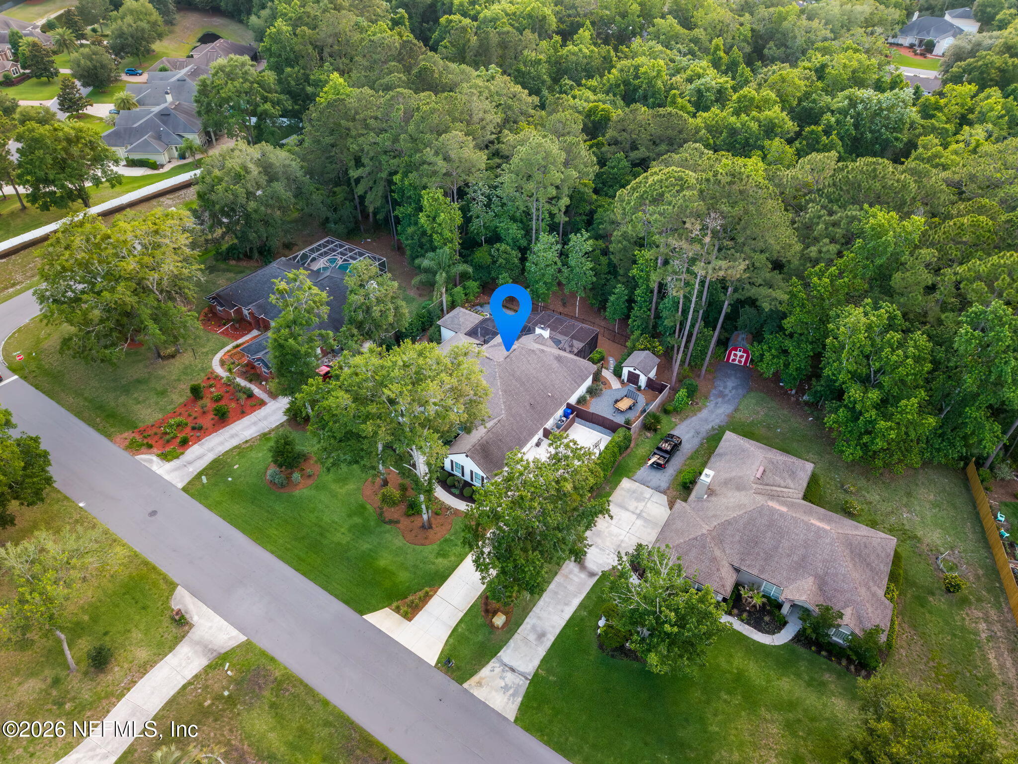 1204 Creek Bend Road St. Johns, FL 32259 - Photo 102 of 107 an aerial view of a house with a yard