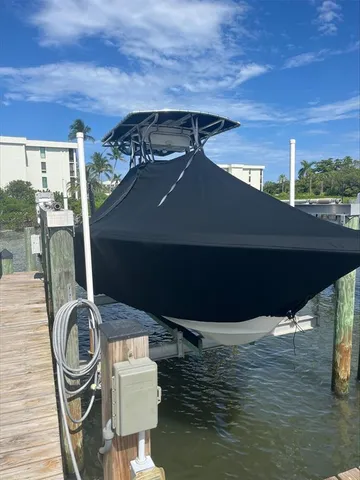 an roof deck with dining table and chairs