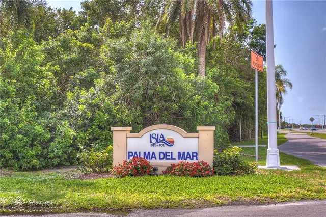 a sign on the side of the road