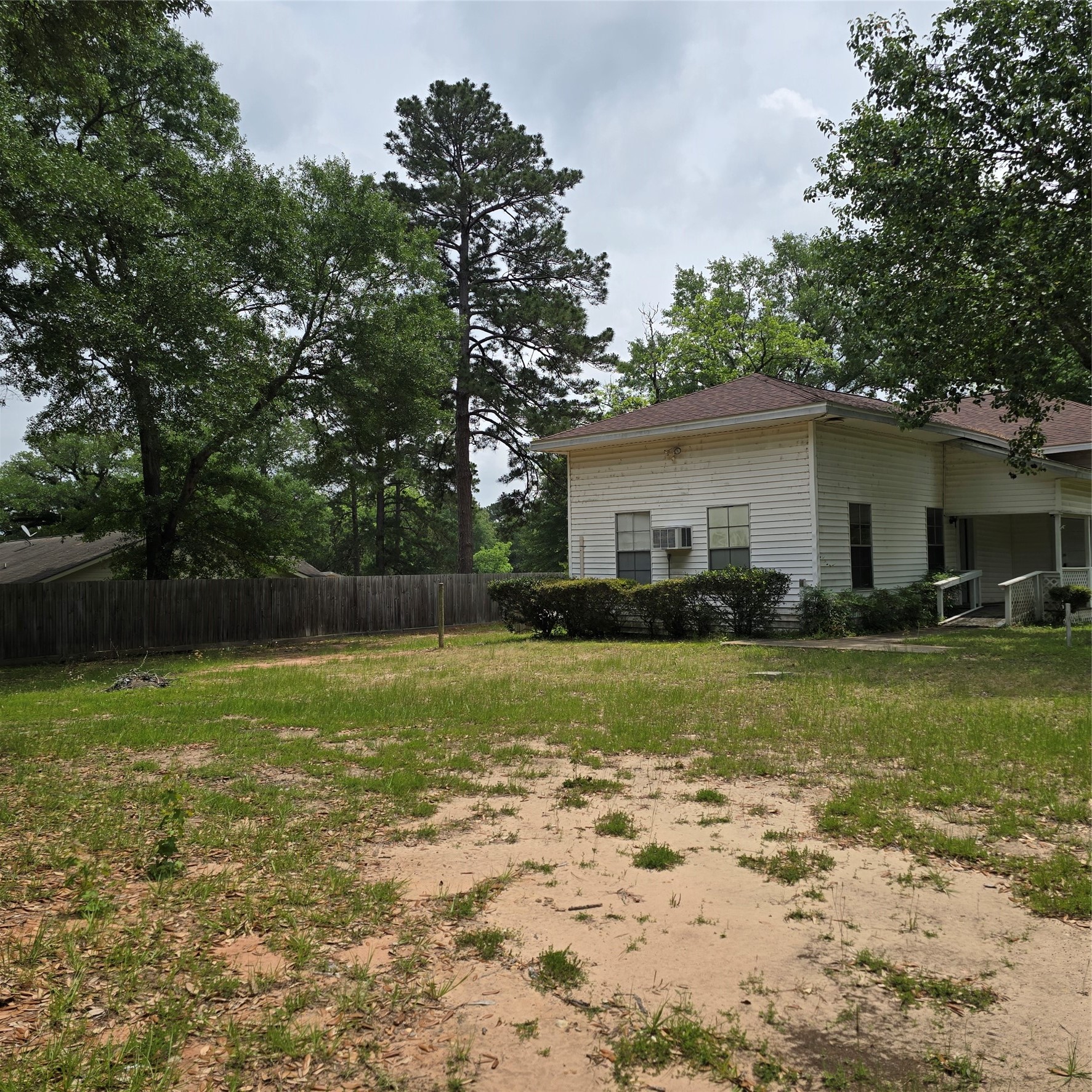 142 Rowe Lane Moscow, TX 75960 - Photo 6 of 16 a front view of house with yard and green space