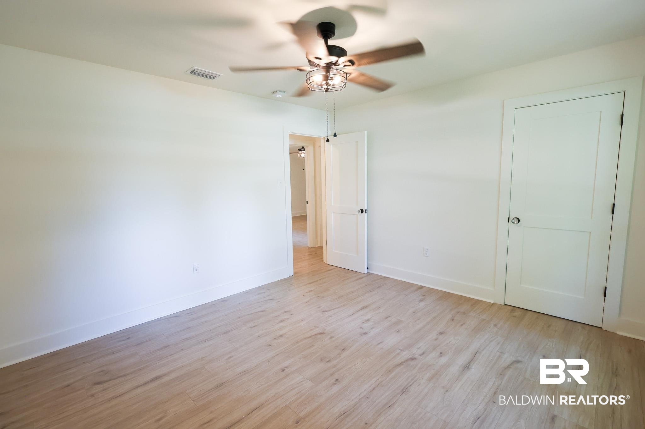 12190 Pecan Grove Street Magnolia Springs, AL 36555 - Photo 16 of 45 Unfurnished bedroom featuring light wood-type flooring and ceiling fan