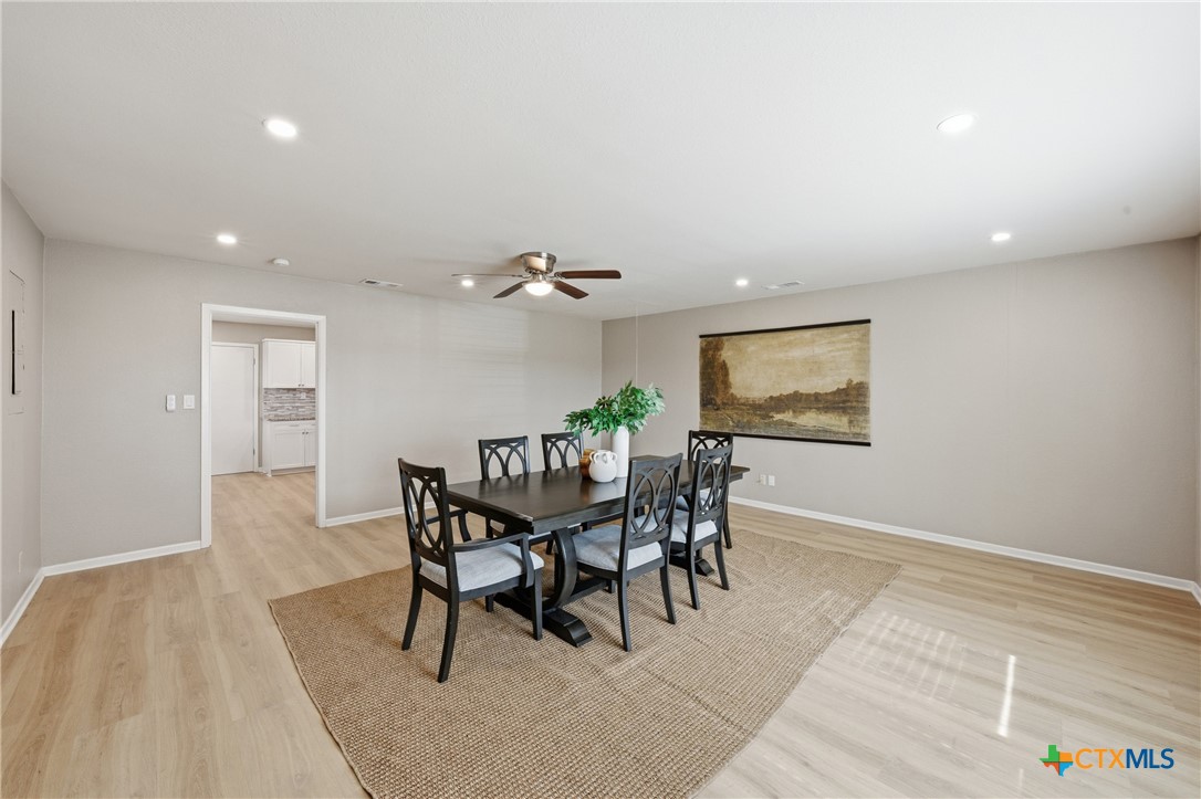 6950 Stallion Road Temple, TX 76501 - Photo 17 of 41 a dining room with furniture and window