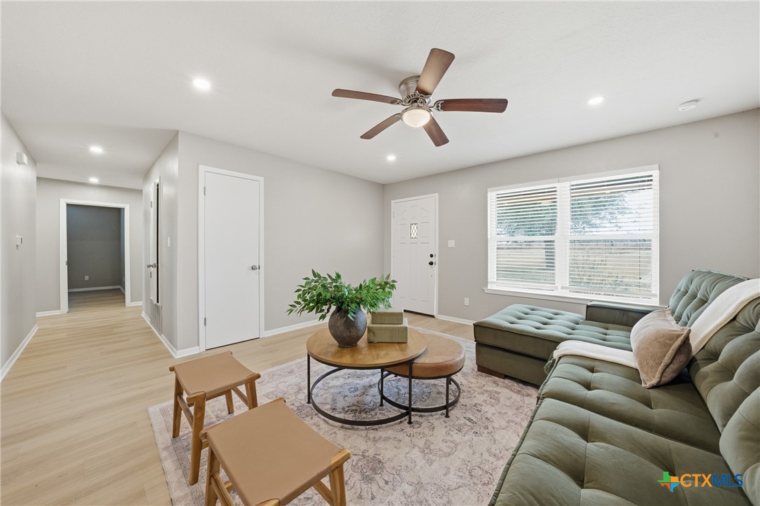 6950 Stallion Road Temple, TX 76501 - Photo 21 of 41 a living room with furniture and a large window