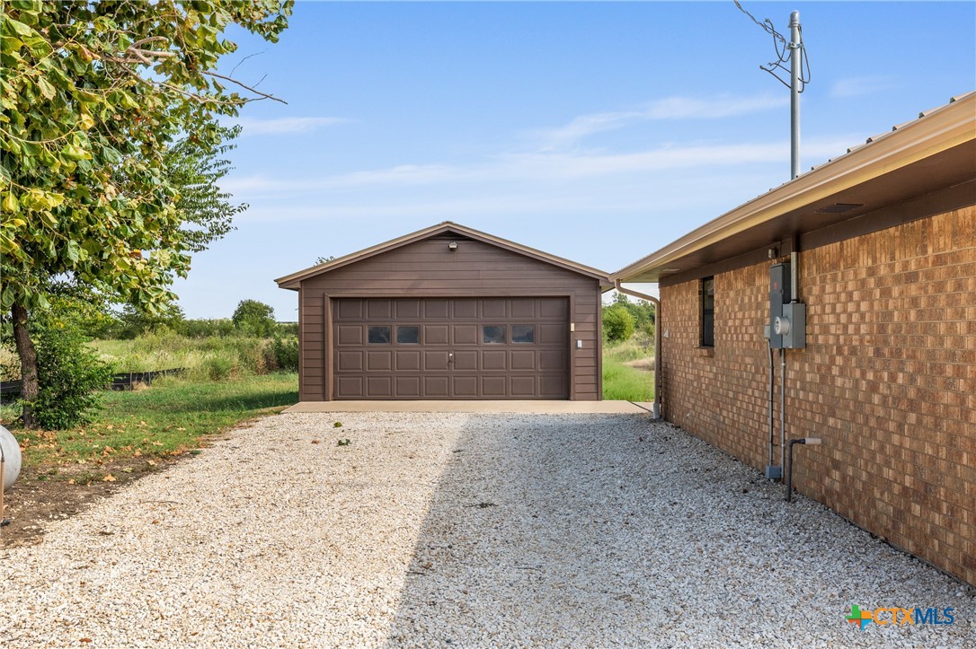 6950 Stallion Road Temple, TX 76501 - Photo 5 of 41 a front view of a house with a yard and garage