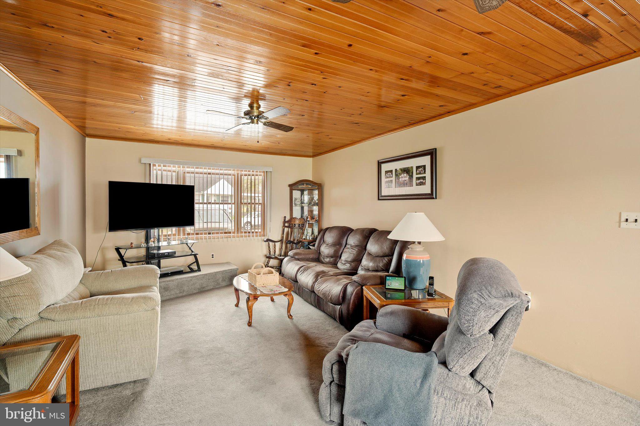 24 Cumberland Road Hamilton, NJ 08690 - Photo 11 of 29 a living room with furniture and a flat screen tv