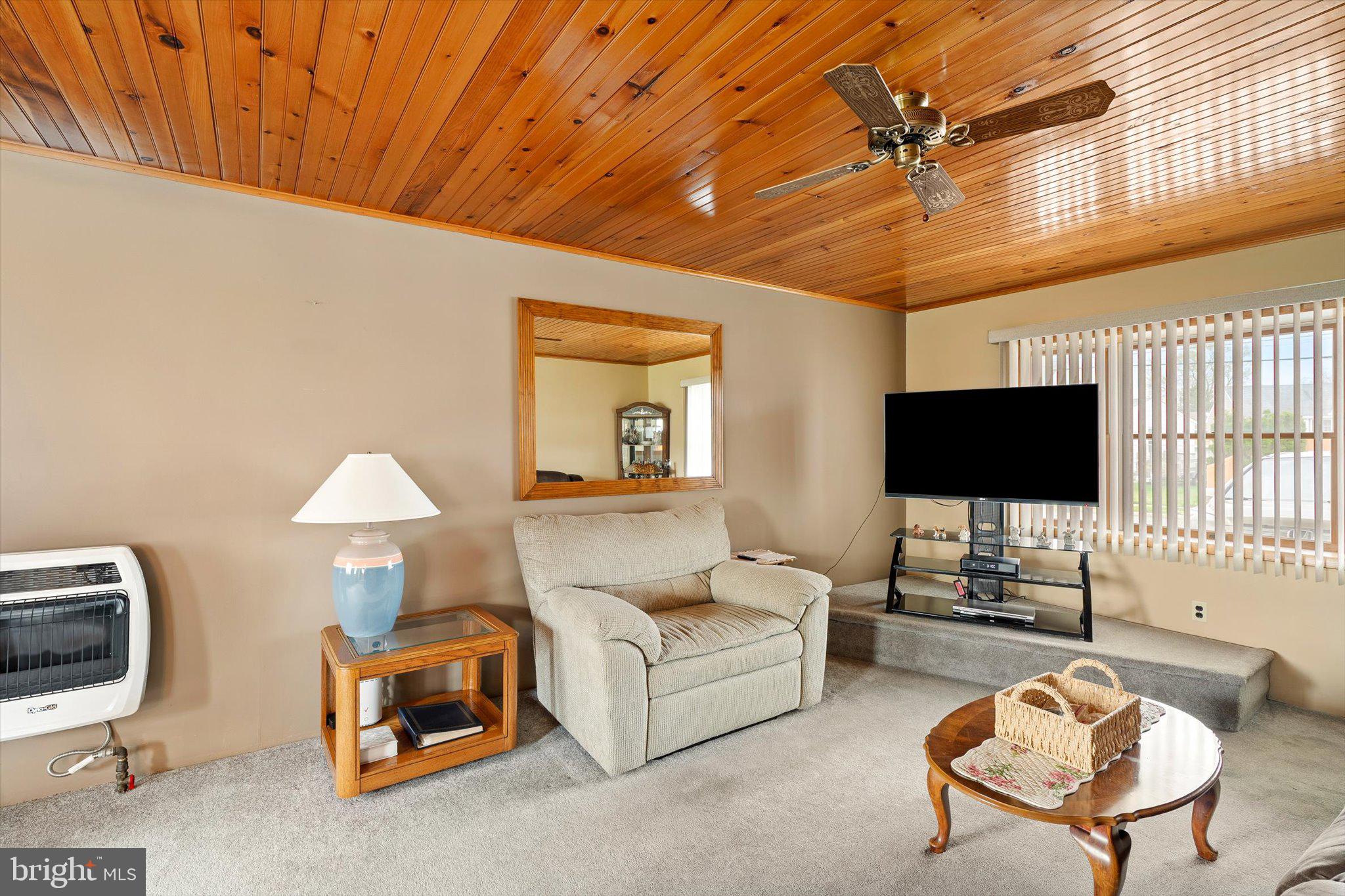 24 Cumberland Road Hamilton, NJ 08690 - Photo 12 of 29 a living room with furniture and a flat screen tv