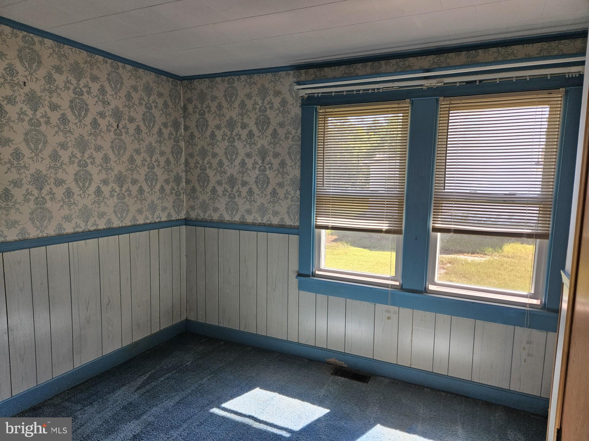 2796 Calvary Road Crisfield, MD 21817 - Photo 15 of 17 a view of an empty room with a window