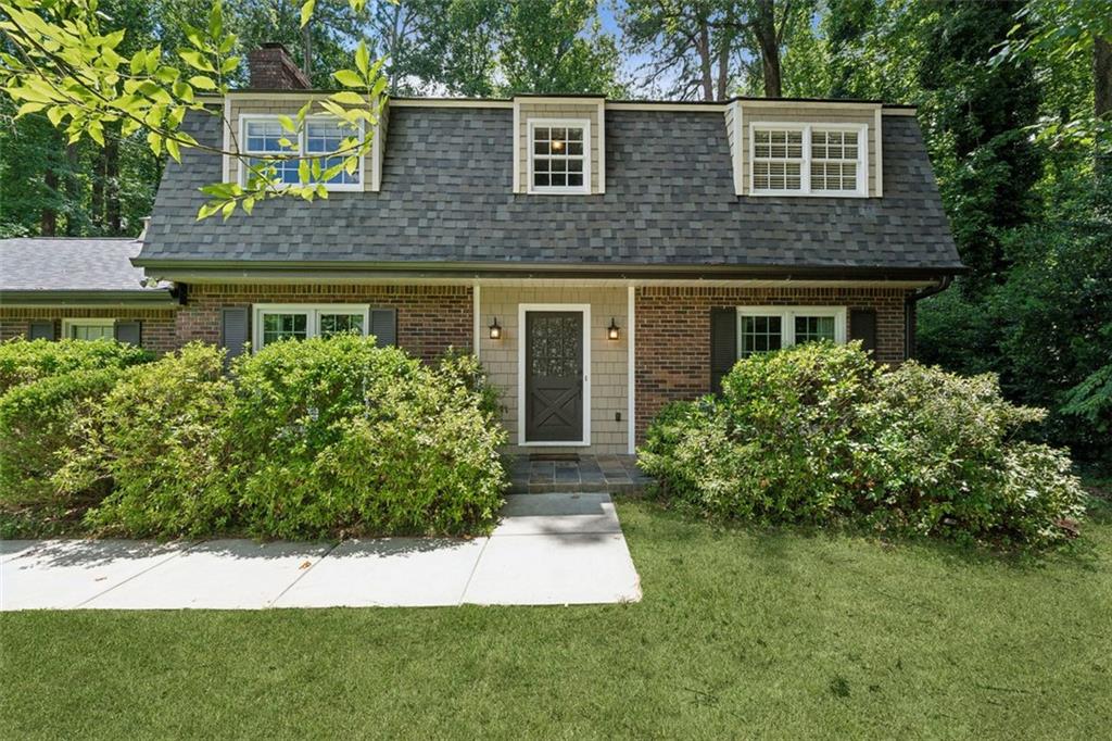 front view of house with a yard