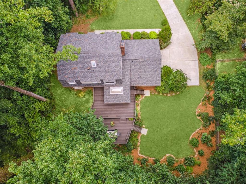 3675 Toxaway Court Chamblee, GA 30341 - Photo 2 of 37 an aerial view of a house with a yard and pool