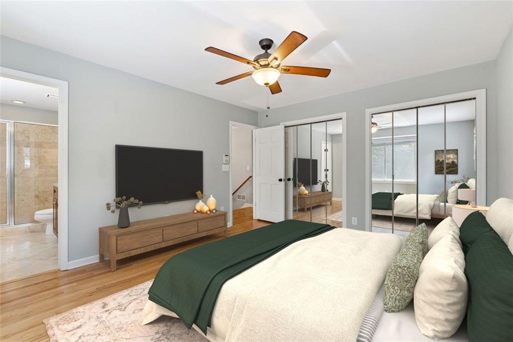 3675 Toxaway Court Chamblee, GA 30341 - Photo 22 of 37 a bedroom with a bed and a large window