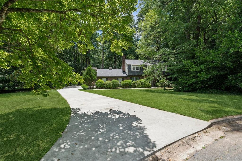 3675 Toxaway Court Chamblee, GA 30341 - Photo 4 of 37 a view of a park with of a house in the background