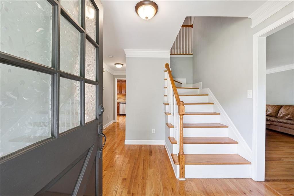 3675 Toxaway Court Chamblee, GA 30341 - Photo 6 of 37 a view of entryway and hall with wooden floor