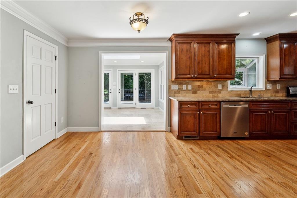 3675 Toxaway Court Chamblee, GA 30341 - Photo 9 of 37 a view of a kitchen with cabinets and wooden floor